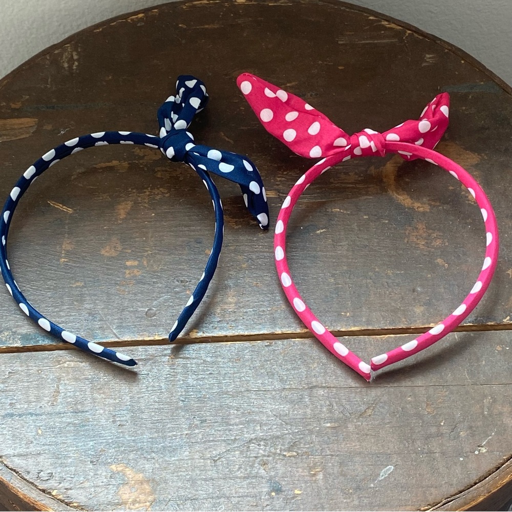 Like new, red and blue with white polka dots and wire bows headband set